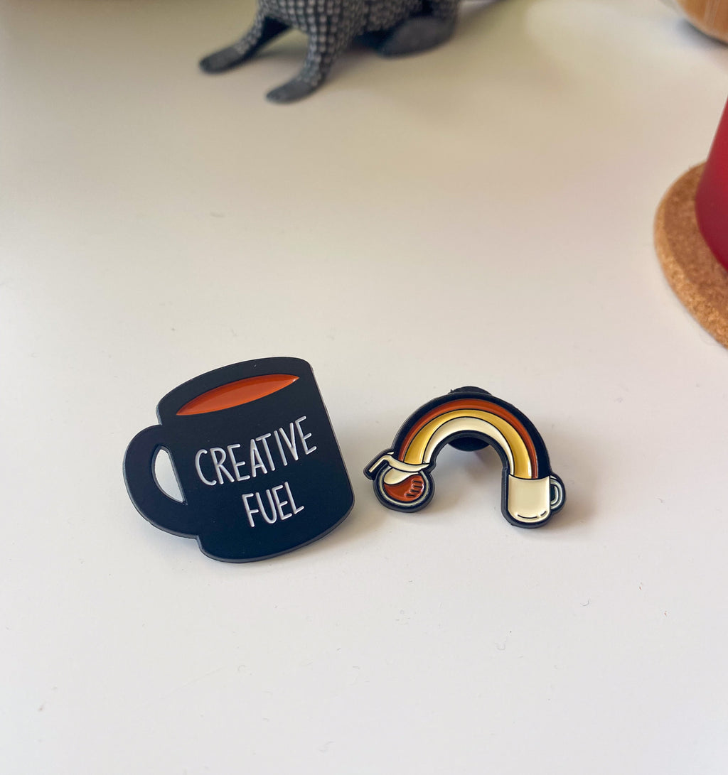 Pines taza y arcoíris