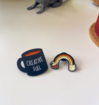 Pines taza y arcoíris